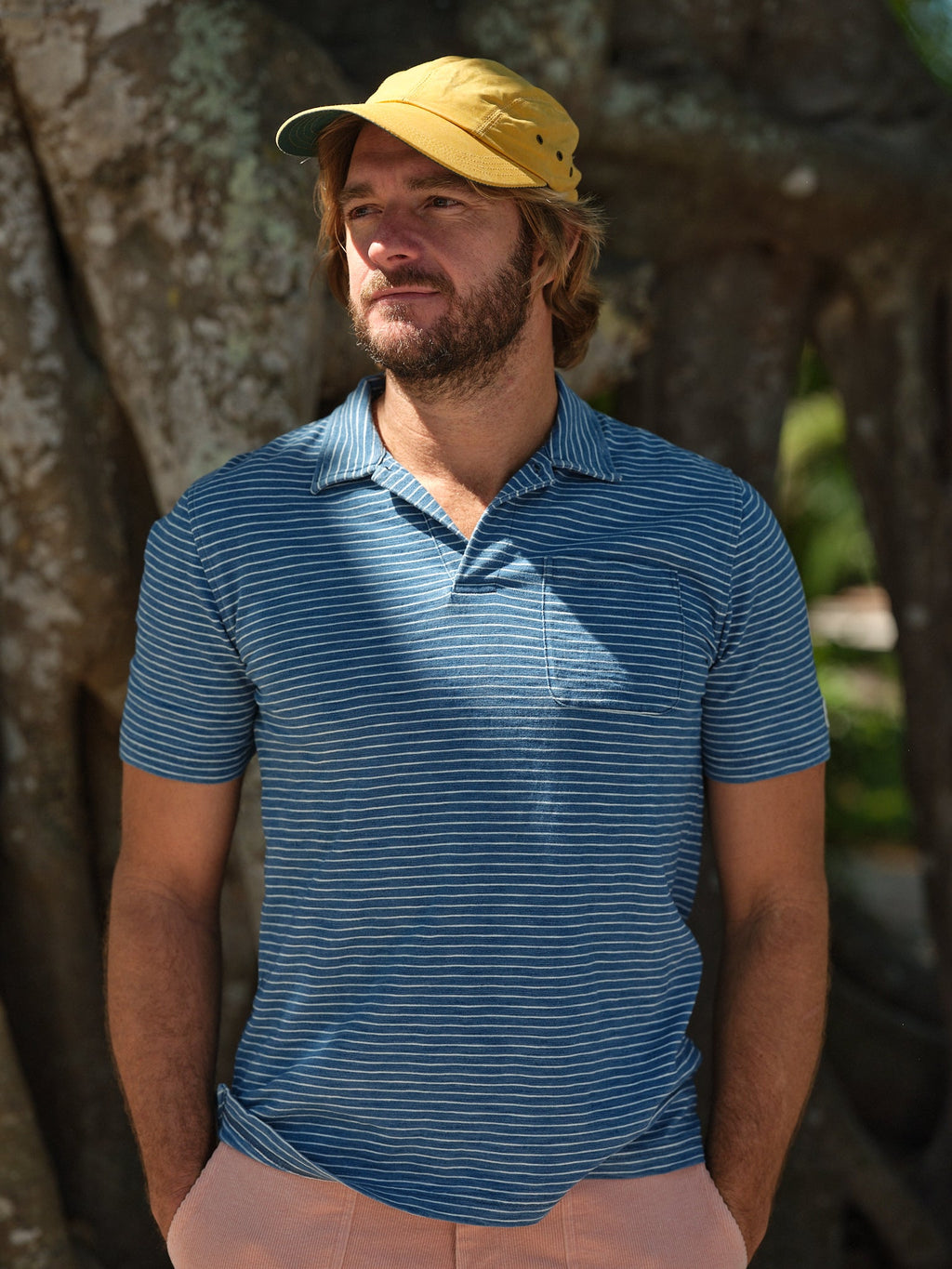 Indigoblauw poloshirt in blauw-witte slubstreep