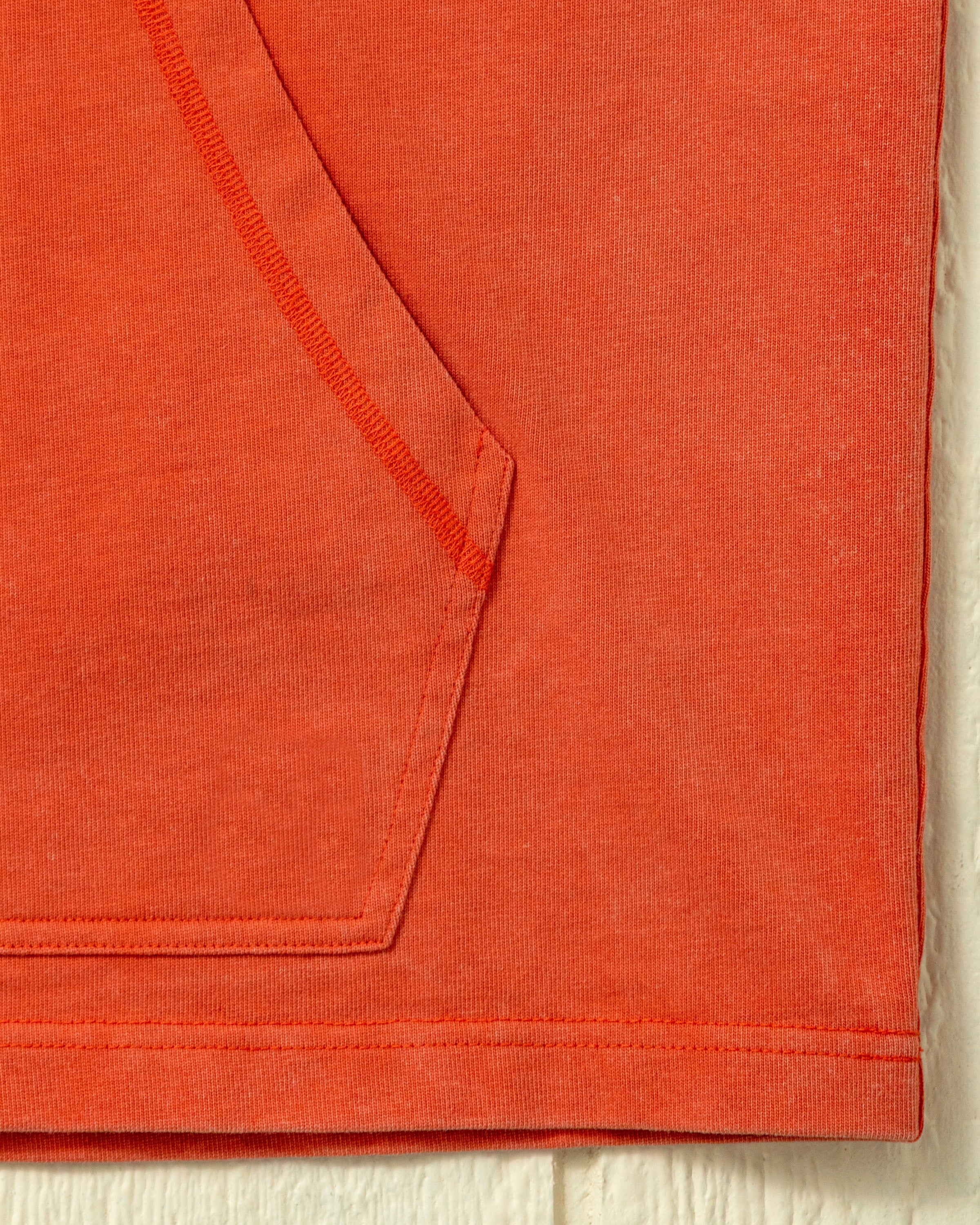 Zoutgewassen hoodie in gebrand oranje